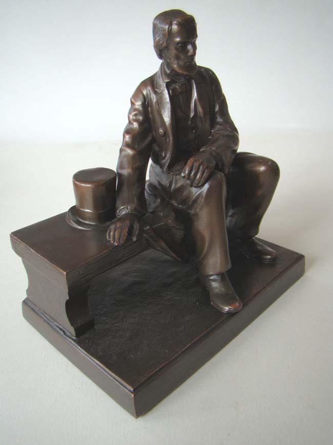 A Wonderful pair of Antique Bookends depicting Abraham Lincoln sitting on a bench circa 1926 — image 3